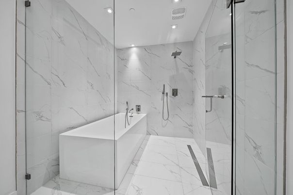 Bathroom, Dual Sink Vanities, Glass Shower, Interior, Marble, Marble Walls, Recessed Lighting
