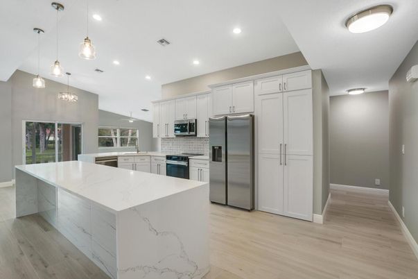 Interior, Kitchen, Pendant Lights, Recessed Lighting, Stainless Steel Appliances, Wood Texture Flooring