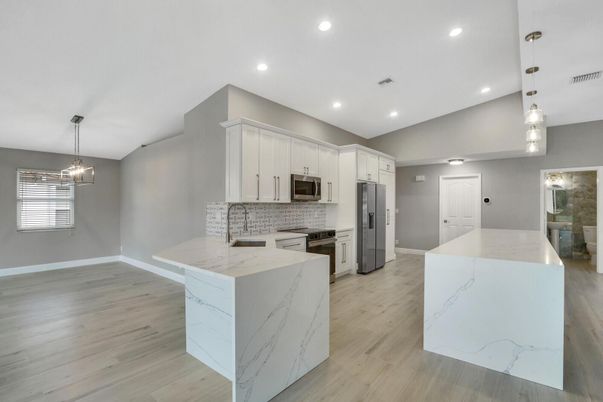 Interior, Kitchen, Pendant Lights, Recessed Lighting, Stainless Steel Appliances, Wood Texture Flooring