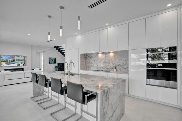 Interior, Kitchen, Marble Walls, Pendant Lights, Recessed Lighting, Stainless Steel Appliances