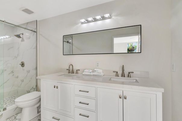 Bathroom, Dual Sink Vanities, Glass Shower, Interior, Marble, Marble Walls
