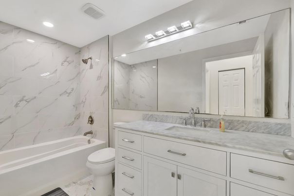 Bathroom, Dual Sink Vanities, Interior, Marble, Marble Walls, Recessed Lighting