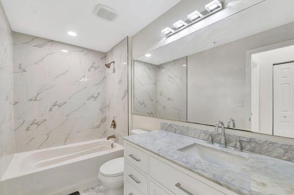 Bathroom, Dual Sink Vanities, Interior, Marble Walls, Recessed Lighting