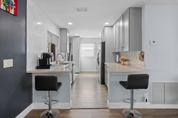 Interior, Kitchen, Marble Walls, Recessed Lighting, Wood Texture Flooring