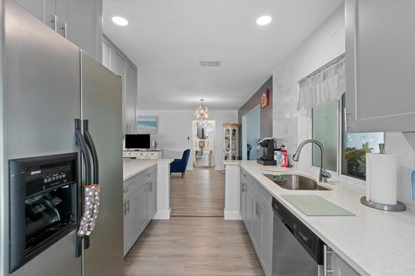Chandelier, Interior, Kitchen, Recessed Lighting, Stainless Steel Appliances, Wood Texture Flooring