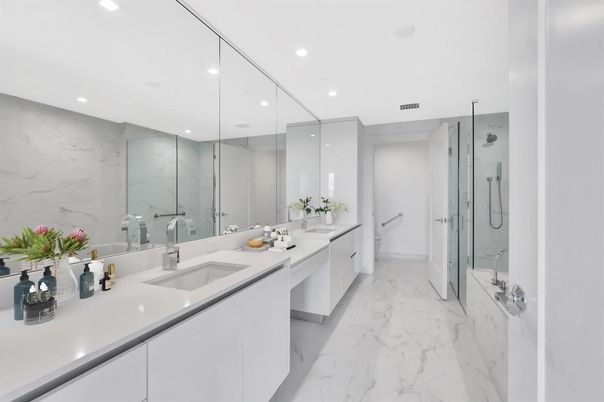 Bathroom, Dual Sink Vanities, Glass Shower, Interior, Marble, Marble Walls, Recessed Lighting