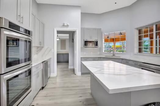 Interior, Kitchen, Recessed Lighting, Stainless Steel Appliances, Wood Texture Flooring