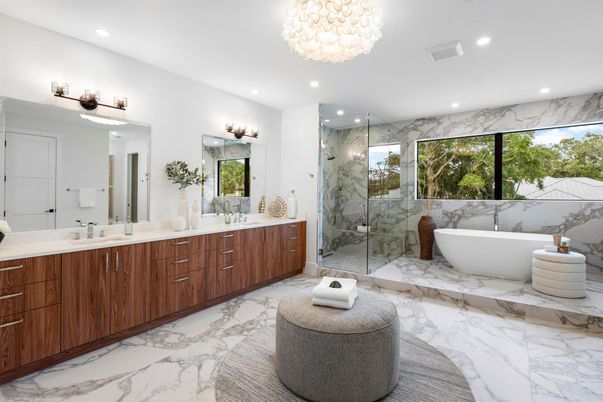Bathroom, Chandelier, Dual Sink Vanities, Free Standing Baths, Glass Shower, Interior, Marble, Marble Walls, Recessed Lighting