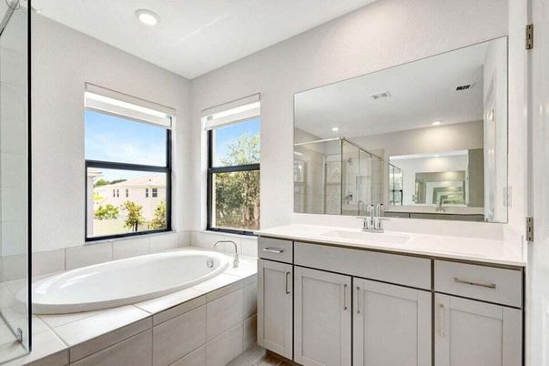 Bathroom, Dual Sink Vanities, Glass Shower, Interior, Recessed Lighting, Tile Countertops