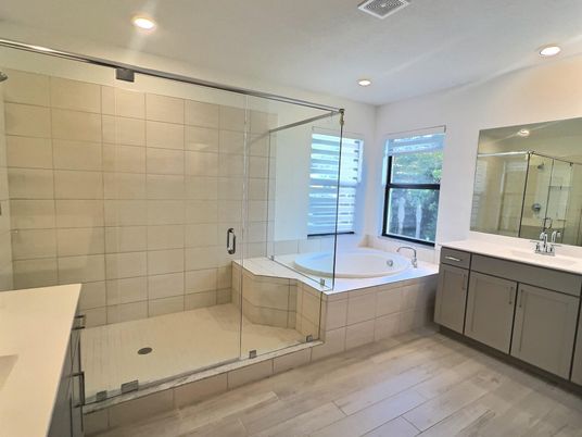 Bathroom, Dual Sink Vanities, Glass Shower, Interior, Recessed Lighting, Wood Texture Flooring