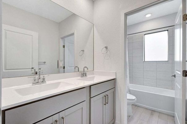 Bathroom, Dual Sink Vanities, Interior, Recessed Lighting, Wood Texture Flooring