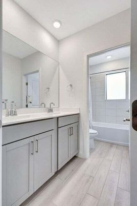 Bathroom, Dual Sink Vanities, Interior, Recessed Lighting, Wood Texture Flooring