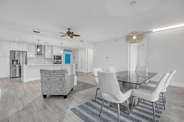 Dining room, Interior, Kitchen, Pendant Lights, Recessed Lighting, Stainless Steel Appliances, Wood Texture Flooring