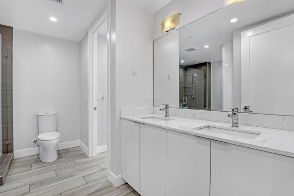 Bathroom, Dual Sink Vanities, Interior, Recessed Lighting, Wood Texture Flooring