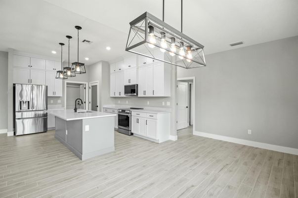 Interior, Kitchen, Pendant Lights, Recessed Lighting, Stainless Steel Appliances, Wood Texture Flooring