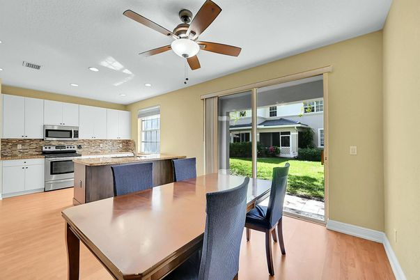 Dining room, Interior, Kitchen, Recessed Lighting, Stainless Steel Appliances, Wood Texture Flooring
