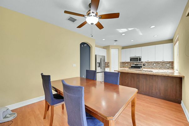 Dining room, Interior, Kitchen, Recessed Lighting, Stainless Steel Appliances, Wood Texture Flooring