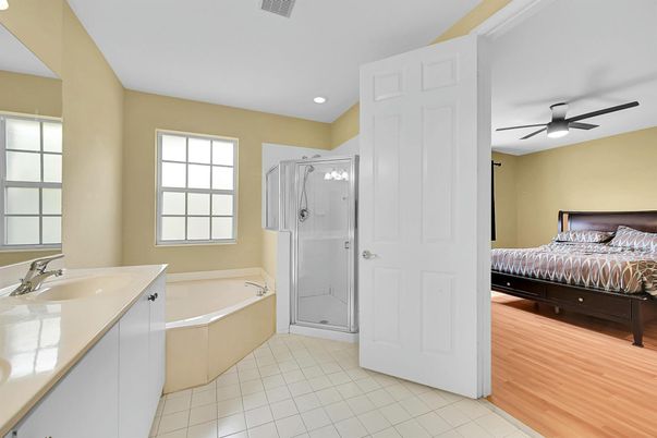 Bathroom, Bedroom, Glass Shower, Interior, Recessed Lighting, Wood Texture Flooring