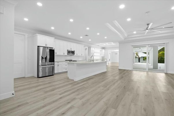 Interior, Kitchen, Recessed Lighting, Stainless Steel Appliances, Wood Texture Flooring