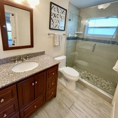 Bathroom, Dual Sink Vanities, Glass Shower, Interior, Wood Texture Flooring