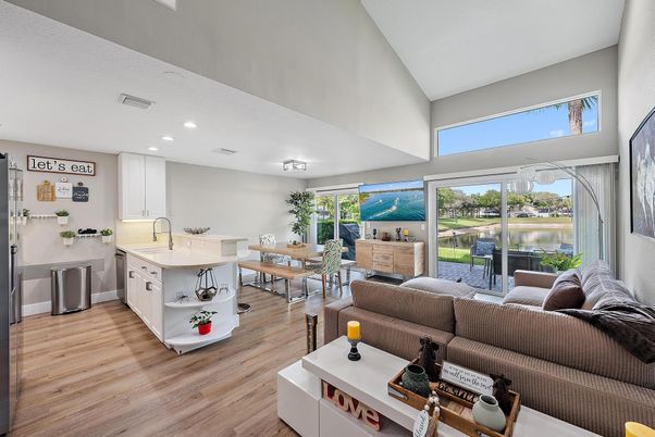 Dining room, Interior, Kitchen, Living room, Recessed Lighting, Water, Wood Texture Flooring