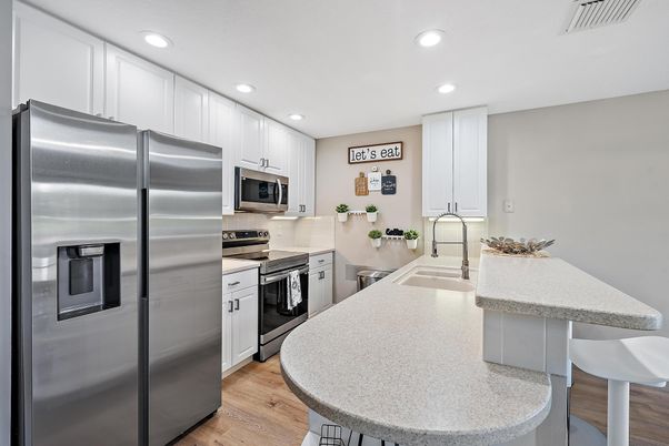 Interior, Kitchen, Recessed Lighting, Stainless Steel Appliances, Wood Texture Flooring