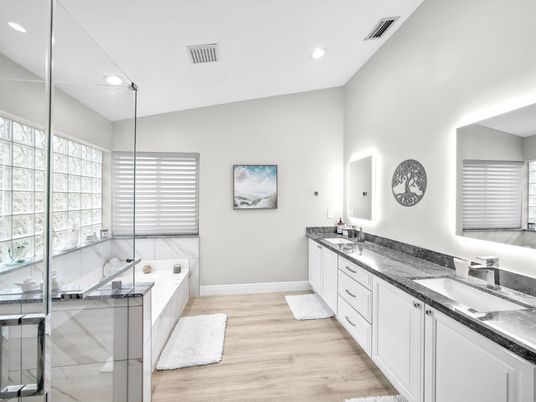 Bathroom, Dual Sink Vanities, Glass Shower, Interior, Recessed Lighting, Wood Texture Flooring