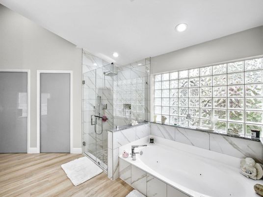 Bathroom, Glass Shower, Interior, Marble Walls, Recessed Lighting, Wood Texture Flooring