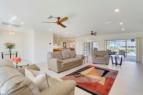 Chandelier, Interior, Kitchen, Living room, Recessed Lighting, Wood Texture Flooring