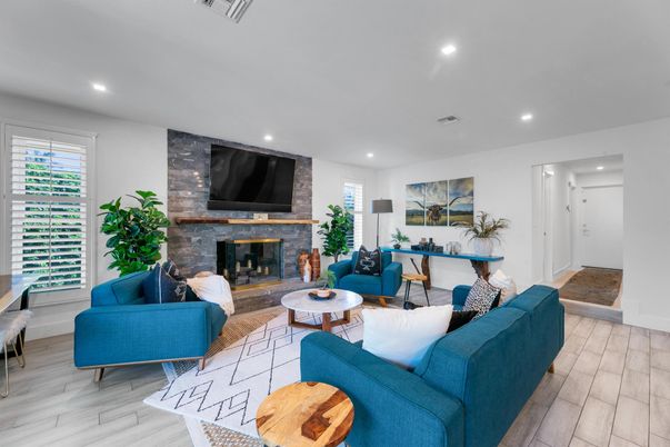 Fireplace, Interior, Living room, Recessed Lighting, Stone Walls, Wood Texture Flooring