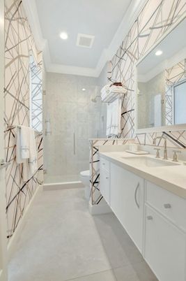 Bathroom, Dual Sink Vanities, Glass Shower, Interior, Marble Walls, Recessed Lighting