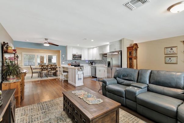Dining room, Interior, Kitchen, Living room, Recessed Lighting, Stainless Steel Appliances, Wood Texture Flooring