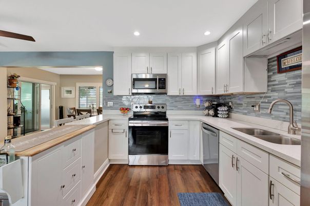 Interior, Kitchen, Recessed Lighting, Stainless Steel Appliances, Wood Texture Flooring