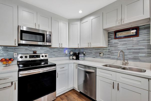 Interior, Kitchen, Recessed Lighting, Stainless Steel Appliances, Wood Texture Flooring