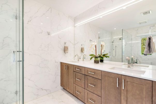 Bathroom, Dual Sink Vanities, Glass Shower, Interior, Marble, Marble Walls, Recessed Lighting
