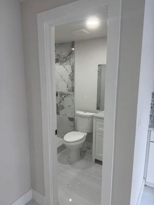 Bathroom, Interior, Marble, Marble Walls, Recessed Lighting, Wood Texture Flooring