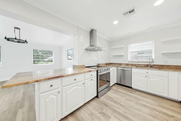 Interior, Kitchen, Recessed Lighting, Stainless Steel Appliances, Wood Texture Flooring