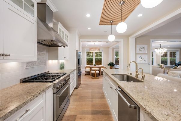 Chandelier, Dining room, Interior, Kitchen, Pendant Lights, Recessed Lighting, Stainless Steel Appliances, Wood Texture Flooring