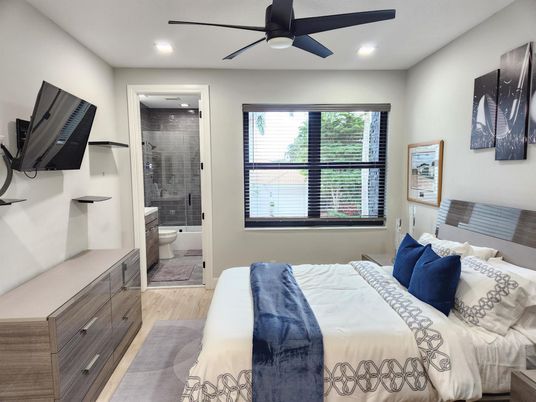 Bathroom, Bedroom, Glass Shower, Interior, Recessed Lighting, Wood Texture Flooring