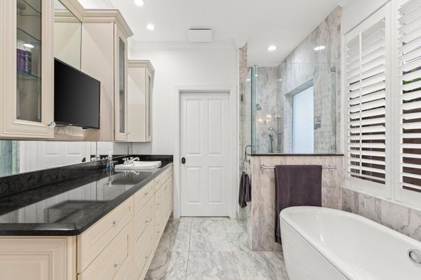 Bathroom, Dual Sink Vanities, Free Standing Baths, Glass Shower, Interior, Marble, Marble Walls, Recessed Lighting