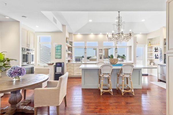 Chandelier, Dining room, Interior, Kitchen, Recessed Lighting, Stainless Steel Appliances, Wood Texture Flooring