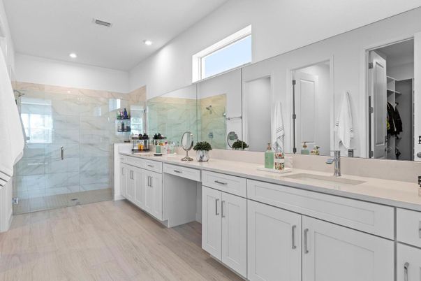 Bathroom, Dual Sink Vanities, Glass Shower, Interior, Marble Walls, Recessed Lighting, Wood Texture Flooring