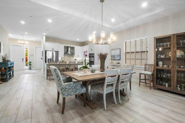 Chandelier, Dining room, Interior, Kitchen, Pendant Lights, Recessed Lighting, Stainless Steel Appliances, Wood Texture Flooring