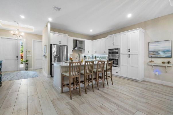 Chandelier, Interior, Kitchen, Recessed Lighting, Stainless Steel Appliances, Wood Texture Flooring