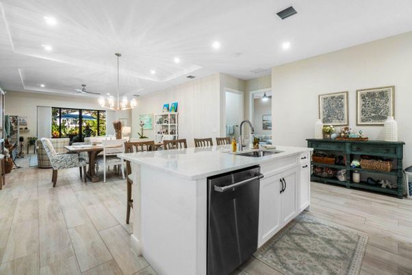 Dining room, Interior, Kitchen, Pendant Lights, Recessed Lighting, Stainless Steel Appliances, Wood Texture Flooring