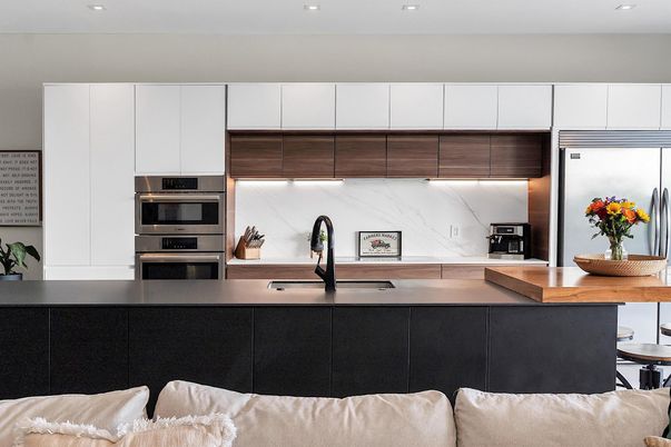 Interior, Kitchen, Marble Walls, Recessed Lighting, Stainless Steel Appliances