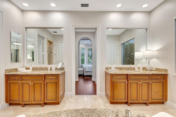 Bathroom, Dual Sink Vanities, Interior, Recessed Lighting, Wood Texture Flooring