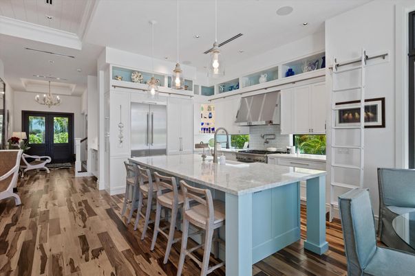 Chandelier, Interior, Kitchen, Pendant Lights, Recessed Lighting, Stainless Steel Appliances, Wood Texture Flooring