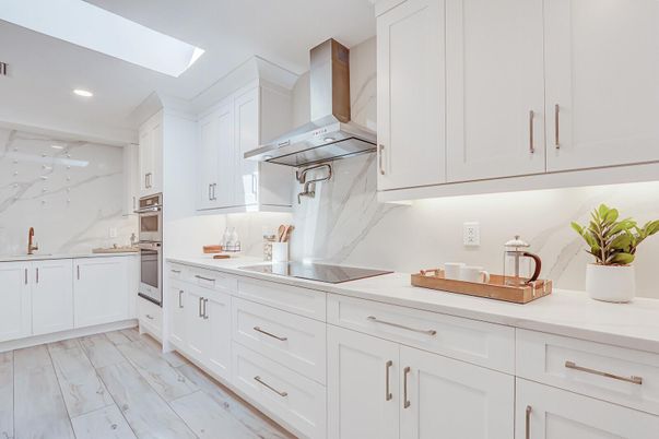 Interior, Kitchen, Marble, Marble Walls, Recessed Lighting, Stainless Steel Appliances, Wood Texture Flooring
