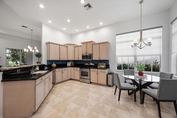 Chandelier, Dining room, Interior, Kitchen, Pendant Lights, Recessed Lighting, Stainless Steel Appliances
